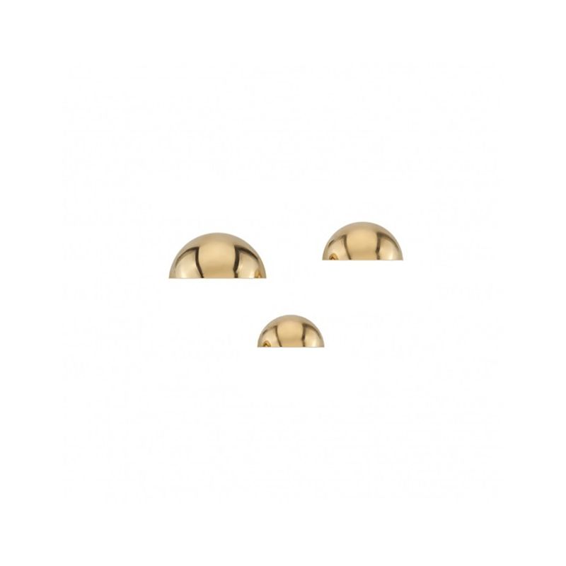 Trio of polished 14k gold dome-top piercing pins on a white background