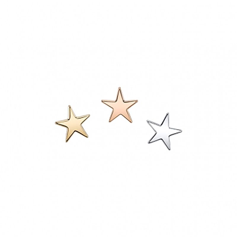 Trio of flat star piercing pins in yellow gold, rose gold, and white gold